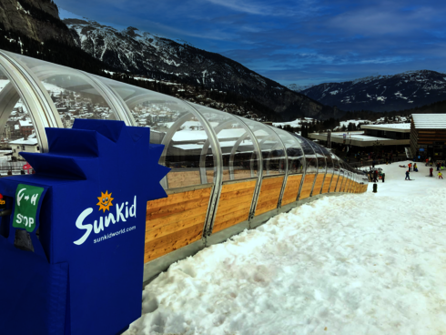 Sunny Moving Carpet ride in wood clad gallery