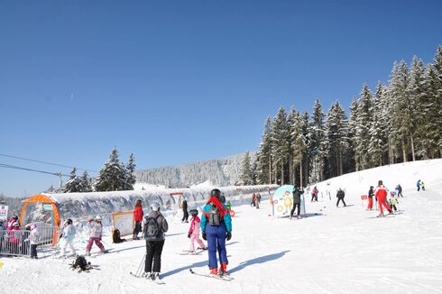 Moving Carpet: Ski Kinderland with Schmidolin's Dragon Tunnel