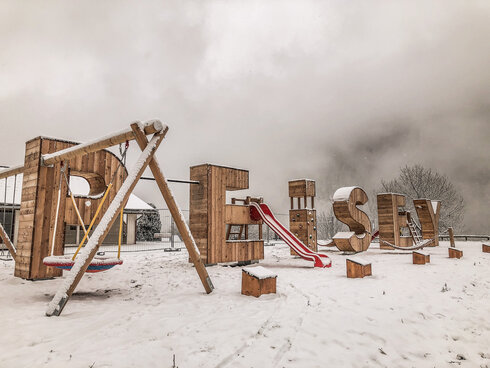 Wooden letters on the road to success